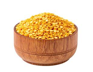 Pile of yellow split peas in a wooden bowl