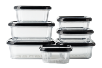 Stack of clear glass food storage containers with black lids, isolated on transparent background