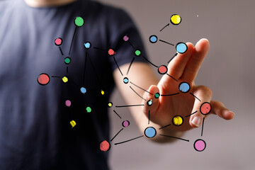 Close-up image of a man's hand reaching out, perfect for concepts of interaction, technology, or...