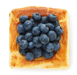 Tasty puff pastry with blueberries isolated on white, top view