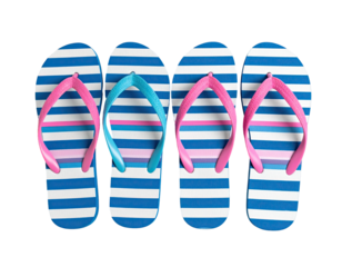 Pair of colorful striped flip-flops, laid flat