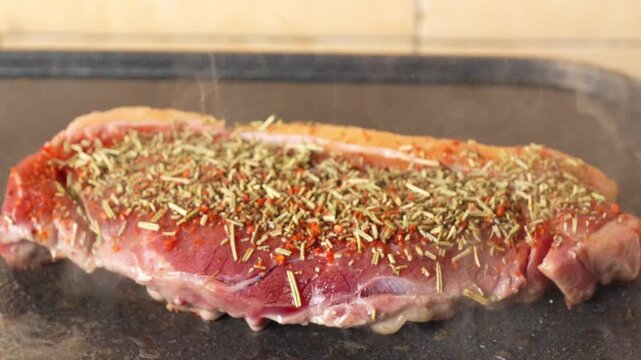 Close-up of juicy grilled steak with rich texture under warm light, ideal for culinary, restaurant, gourmet food, and lifestyle themes.

