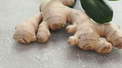 Fresh ginger on wooden background. Dry ginger. Sliced ginger with honey and lemon. Ginger root. Traditional alternative medicine, healing tea for immunity. Seasoning and spices concept. Copy space.