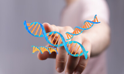 Abstract image of a hand interacting with DNA.  Perfect for genetic research, biotechnology, and...
