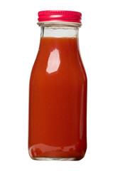 Glass bottles with tomato juice with red caps.