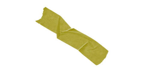 A forgotten piece of masking tape clings to darkness hinting at unfinished projects and creative pauses against a stark