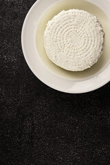 Cottage cheese fermented milk product portion size natural product tasty snack fresh delicious gourmet food background on the table rustic top view copy space keto and paleo diet