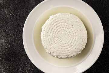 Cottage cheese fermented milk product portion size natural product tasty snack fresh delicious gourmet food background on the table rustic top view copy space keto and paleo diet