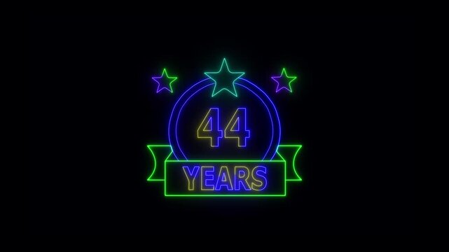 44 Years Anniversary Celebration Neon Sign with Stars and Glowing Banner Highlighting Milestone Achievement and Success.