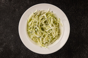 Cabbage salad coleslaw vegetables dish natural product tasty snack fresh delicious gourmet food background on table rustic top view copy space keto and paleo diet vegan and vegan food