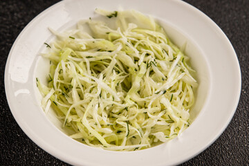 Cabbage salad coleslaw vegetables dish natural product tasty snack fresh delicious gourmet food background on table rustic top view copy space keto and paleo diet vegan and vegan food