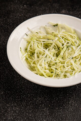 Cabbage salad coleslaw vegetables dish natural product tasty snack fresh delicious gourmet food background on table rustic top view copy space keto and paleo diet vegan and vegan food