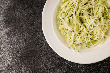 Cabbage salad coleslaw vegetables dish natural product tasty snack fresh delicious gourmet food background on table rustic top view copy space keto and paleo diet vegan and vegan food