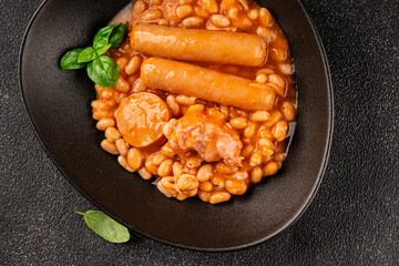 Cassoulet beans with meat and sausage french cuisine vegetables dish natural product tasty snack fresh delicious gourmet food background on the table rustic top view copy space