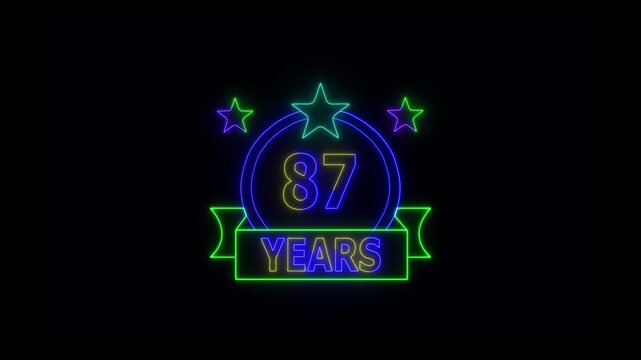 87 Years Anniversary Celebration Neon Sign with Stars and Glowing Banner Highlighting Milestone Achievement and Success.