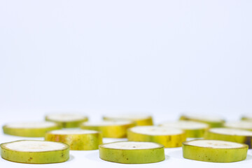 Side View of Sliced Bananas on a White Background