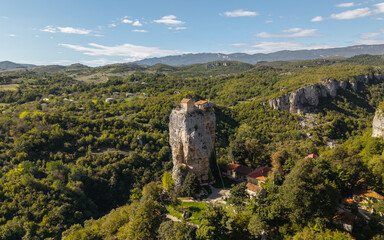 Drone view of Katskhi Pillar, a monastery built on a tall rock in Georgia