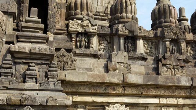Detailed views of ancient carvings and statues at Prambanan Temple, Yogyakarta, Indonesia