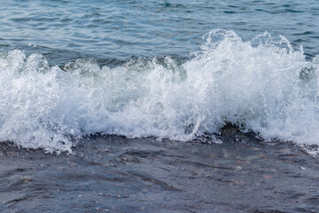 Close up shot of the sea wave. Background