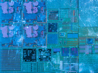 macro photography of semiconductor chip circuit with colorful reflection