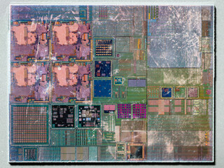 macro photography of semiconductor chip circuit with colorful reflection