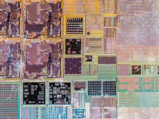 macro photography of semiconductor chip circuit with colorful reflection