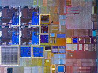 macro photography of semiconductor chip circuit with colorful reflection