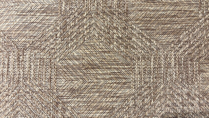 Natural woven fabric texture with geometric pattern in beige and brown tones, rustic handmade textile background