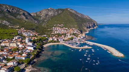 Cala Gonone, Sardinia, Italy – turquoise sea, rocky coast and Mediterranean nature, aerial view © Tommaso