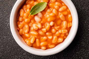 Beans tomato sauce vegetables dish natural product tasty snack fresh delicious gourmet food background on the table rustic top view copy space keto and paleo diet vegan and vegan food