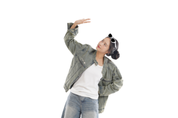 Stylish Young Woman Posing in Studio: A fashion-forward young woman strikes a pose, displaying her style and charisma with a modern look. 