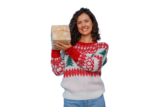 Happy woman in festive sweater holding christmas gift, celebrating holiday season with present, transparent background - Powered by Adobe