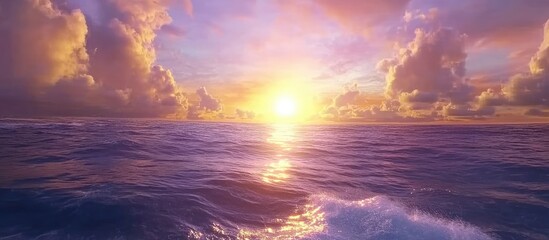 Majestic Ocean Sunset with Fiery Clouds and Reflective Waves