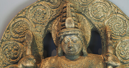 Close-up View on Ancient Statue Of Bhairava Or Frightful, Or Kala Bhairava, Is Shaivite And Vajrayana Deity Worshipped By Hindus And Buddhists. Antique Museum Piece Of Hoyasala Period, Karnataka 12th
