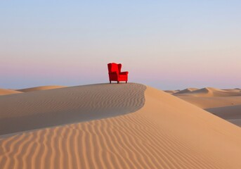 Minimalist and Conceptual Image of a Red Armchair on a Desert Dune