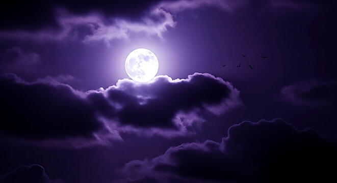 Full moon shining brightly through dramatic purple storm clouds at night