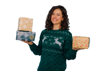 Woman holding christmas gifts, smiling and wearing festive sweater, celebrating holiday season