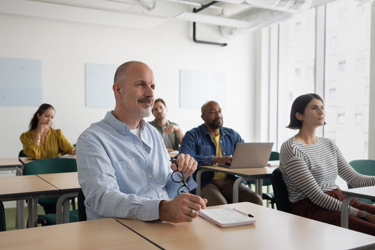 Group of Lifelong Learners listening in class