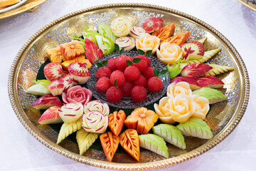 Ritual thai culture and traditional rite sacrificial offerings sweet dessert snack variety fruits vegetables carving for respect blessing to holy deity angel god mystery worship in Ayutthaya, Thailand