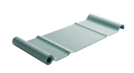 Yoga mat on a smooth surface ready for practice in a peaceful indoor setting during the morning light