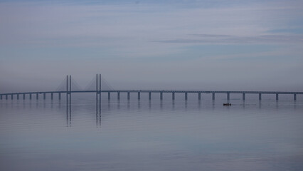 Bridge with boat during blue hour