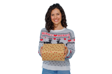 Woman in christmas sweater holding gift box, celebrating holiday joy with presenting present