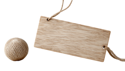 A light beige wooden tag, suspended by light brown twine, and a small textured sphere