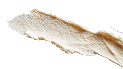Creamy, light beige substance, spread in a textured, uneven smear