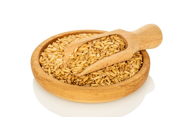 Raw oatmeal isolated on white background, close-up.