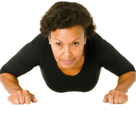 A Fit Woman in Action: Strength and Determination Showcased Through Push-Up Exercise Form with Focused Expression and Defined Muscles on transparent background