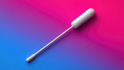 A single white cotton swab lies diagonally against a vibrant gradient background of pink and blue.