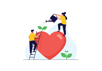 People watering a giant heart to grow plants on top.