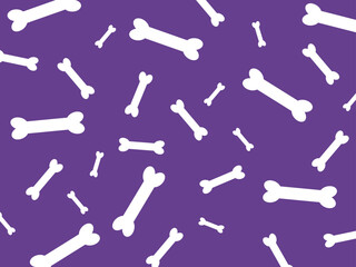 Naklejka premium Seamless bone pattern on purple background