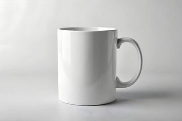 Fototapeta premium Mockup image plain white ceramic mug isolated on white background, showcasing its simple design and smooth surface for beverage enjoyment